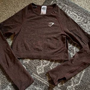 NWOT Gymshark Long sleeve crop top! Size: Small. Color: burgundy